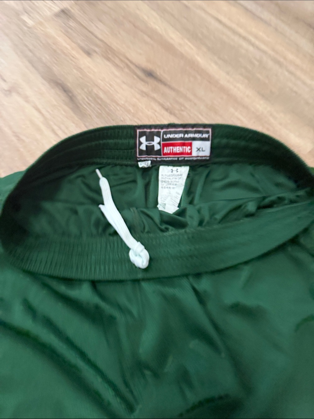 Under Armour Men’s Dark Green Athletic Shorts with White Panels - Picture 3 of 3